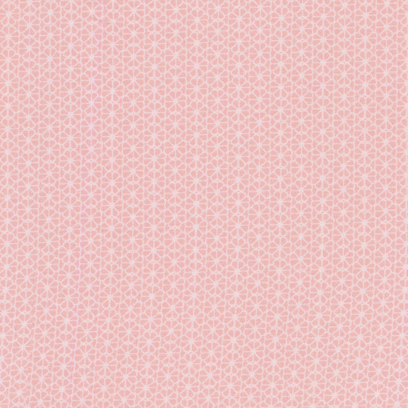 pink fabric with geometric floral design all over 