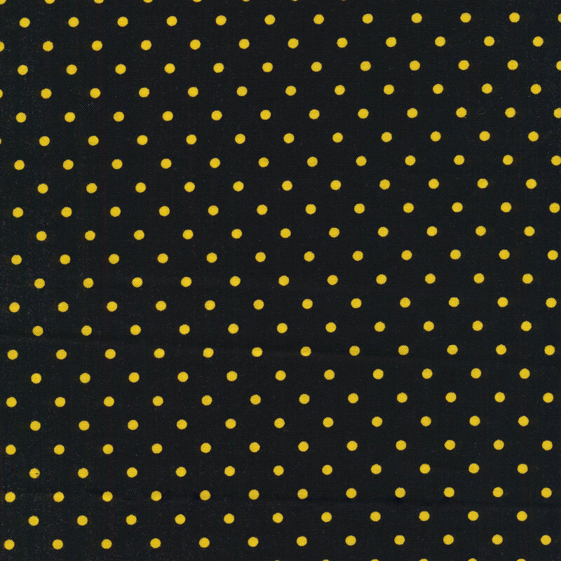 Black fabric with yellow polka dots