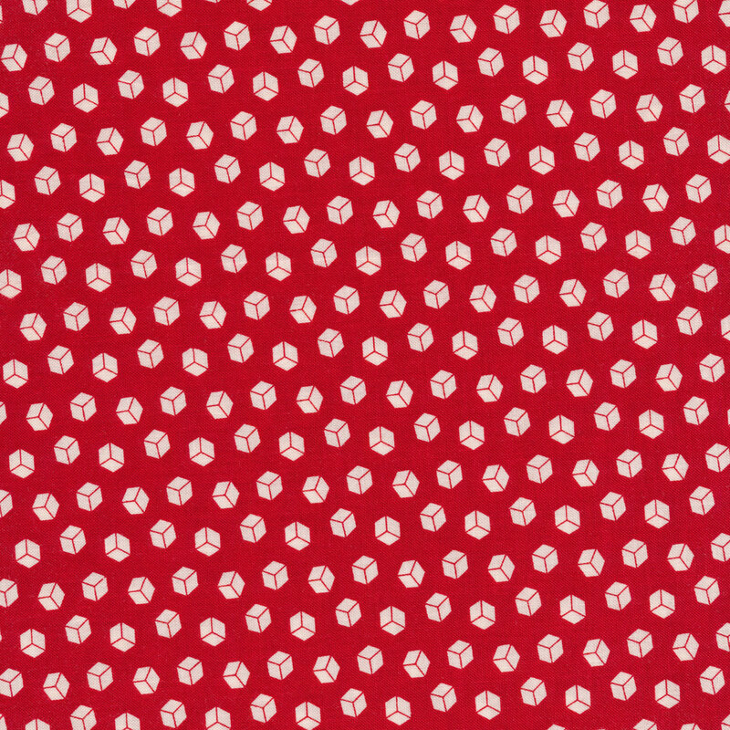 Red fabric with small white cubes all over