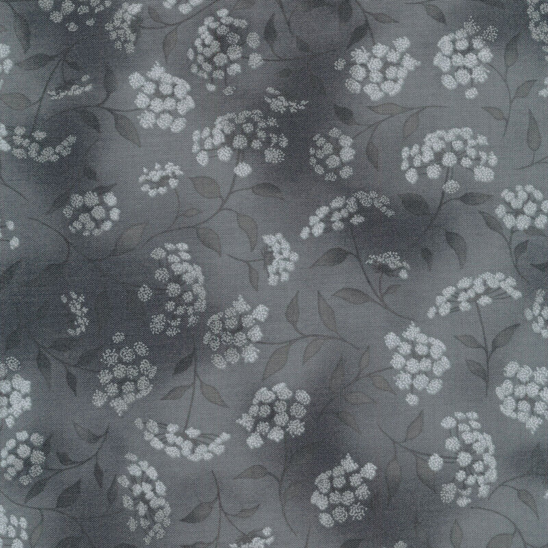 mottled gray fabric featuring leaves, vines and florals 