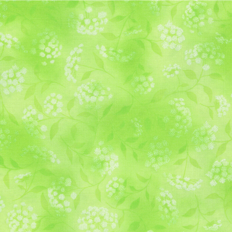 mottled lime green fabric featuring leaves, vines and florals 