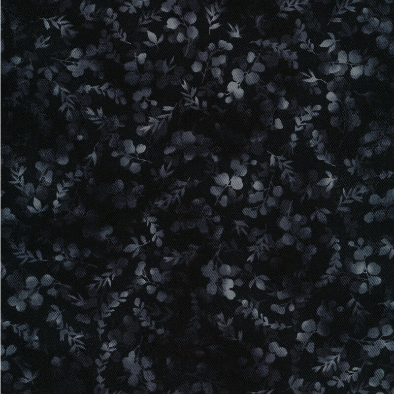 mottled, tonal black fabric featuring leaves and vines