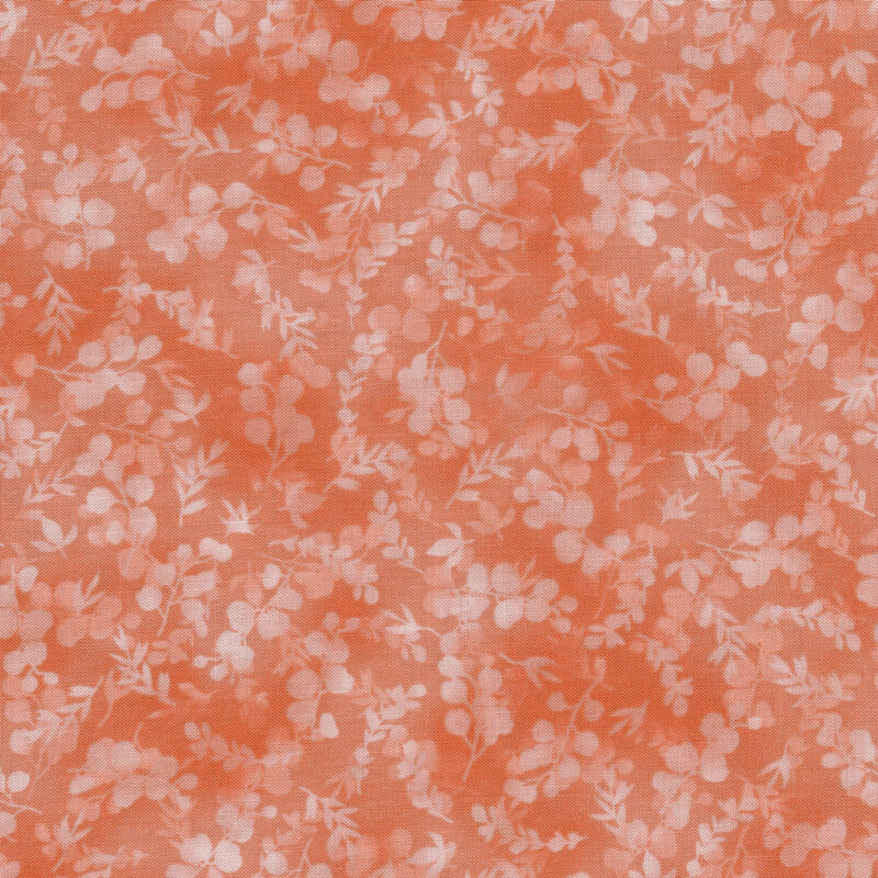 mottled, tonal peach fabric featuring leaves and vines