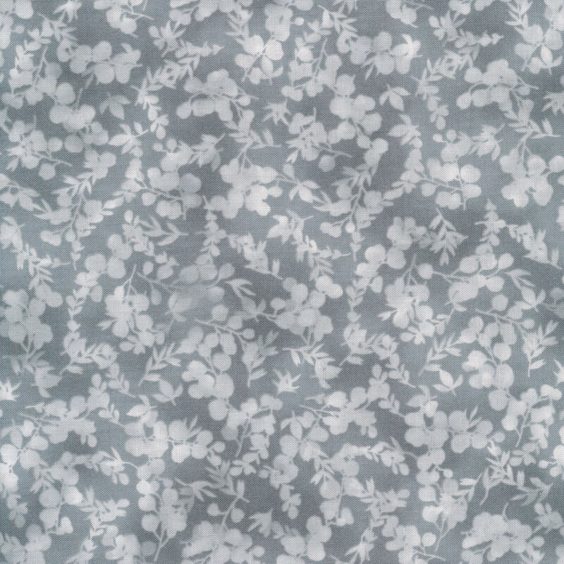 mottled, tonal gray fabric featuring leaves and vines