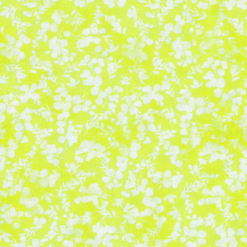 mottled, tonal neon yellow fabric featuring leaves and vines