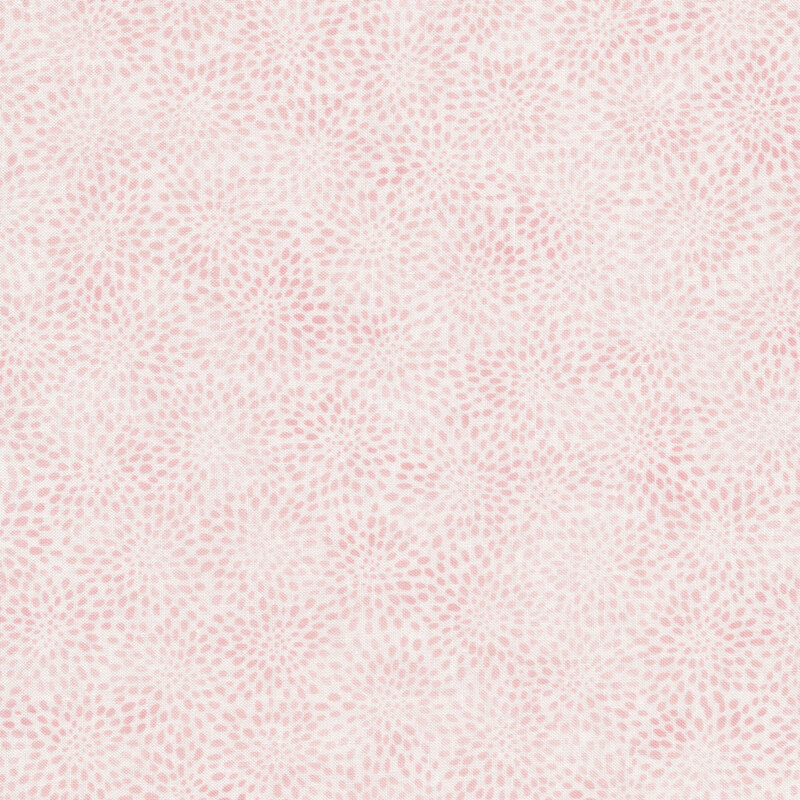 tonal light pink fabric featuring dots all over 