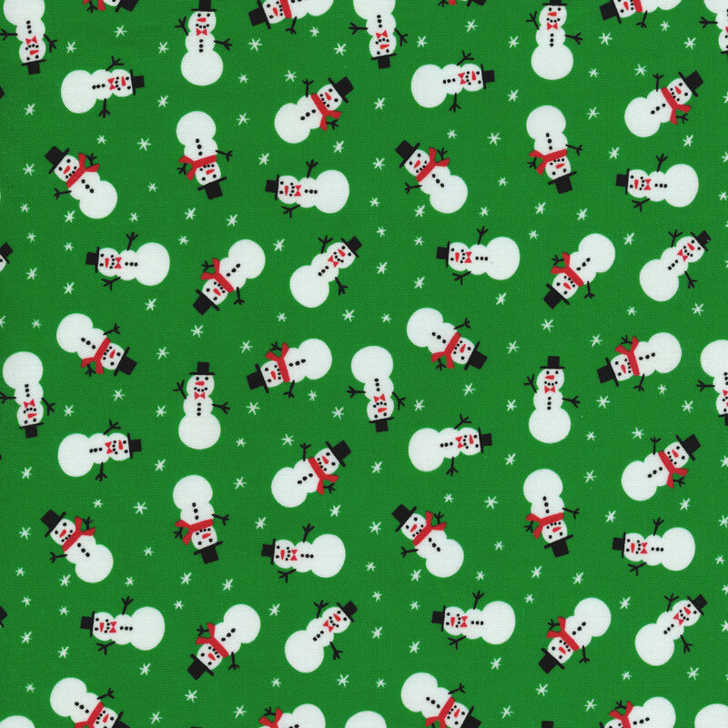 Green fabric with snowmen and tiny white bursts or snowflakes in between