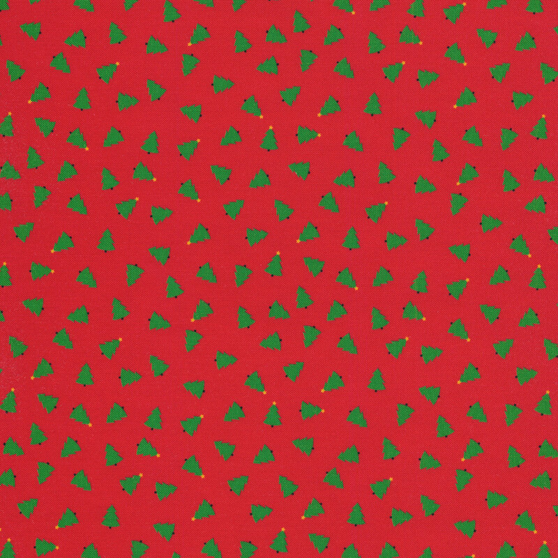Red fabric with green Christmas trees tossed all over