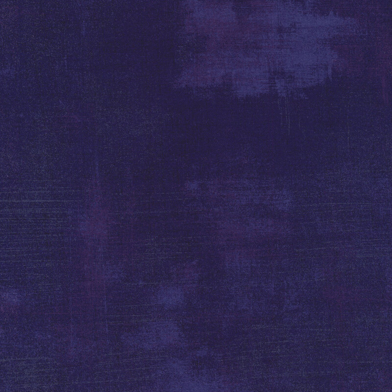 Close up of textured blue fabric with purple accents from the Grunge Basics collection