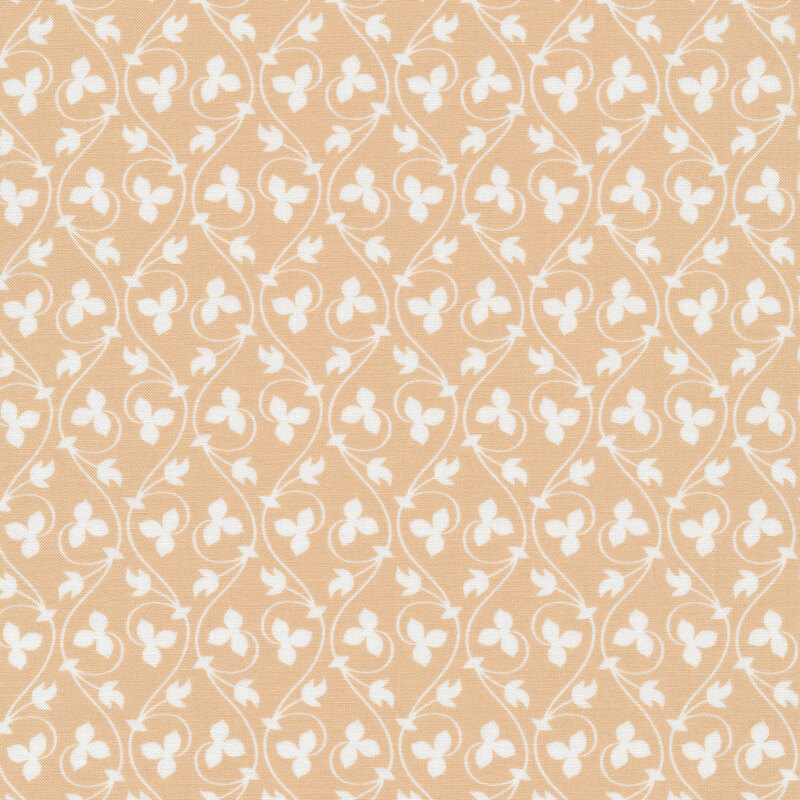 Tan fabric with vertical, curving cream colored leaves and vines