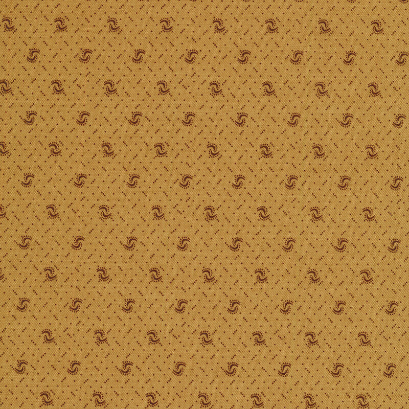 Fabric of a pin dot and curved illustrative print on a caramel colored background.