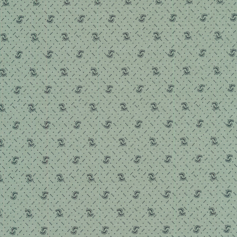 Fabric of a pin dot and curved illustrative print on a light teal background.