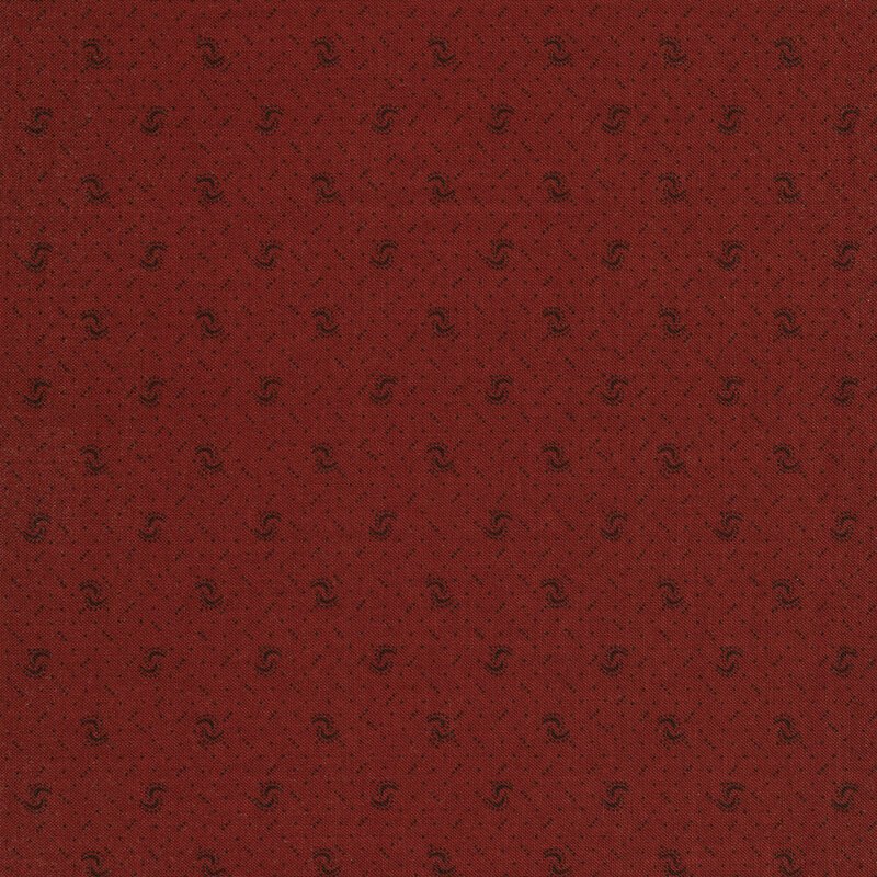 Fabric of a pin dot and curved illustrative print on a brick red background.
