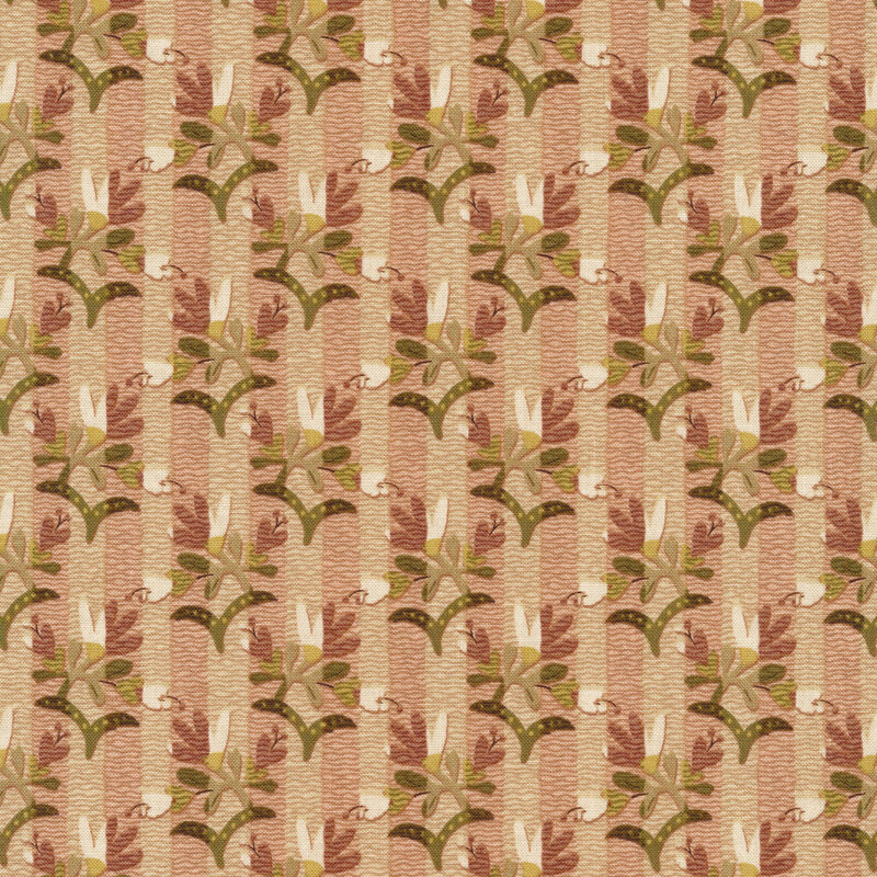 Tan and pink striped fabric with earth toned plants in two contrasting color schemes alternating with each stripe.