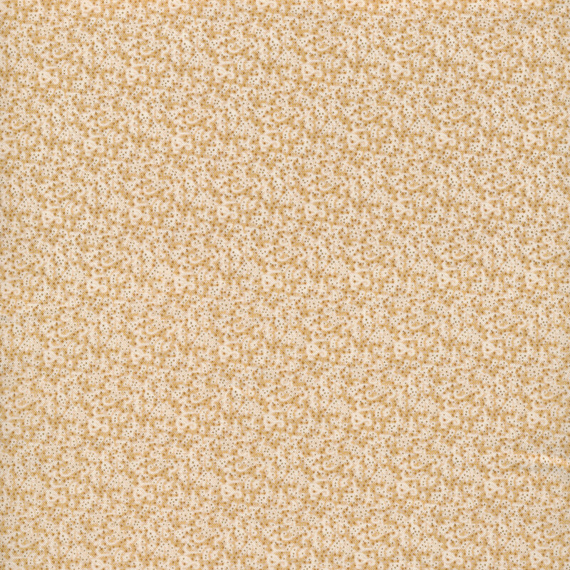 Abstract designs on cream colored fabric with dark dot accents