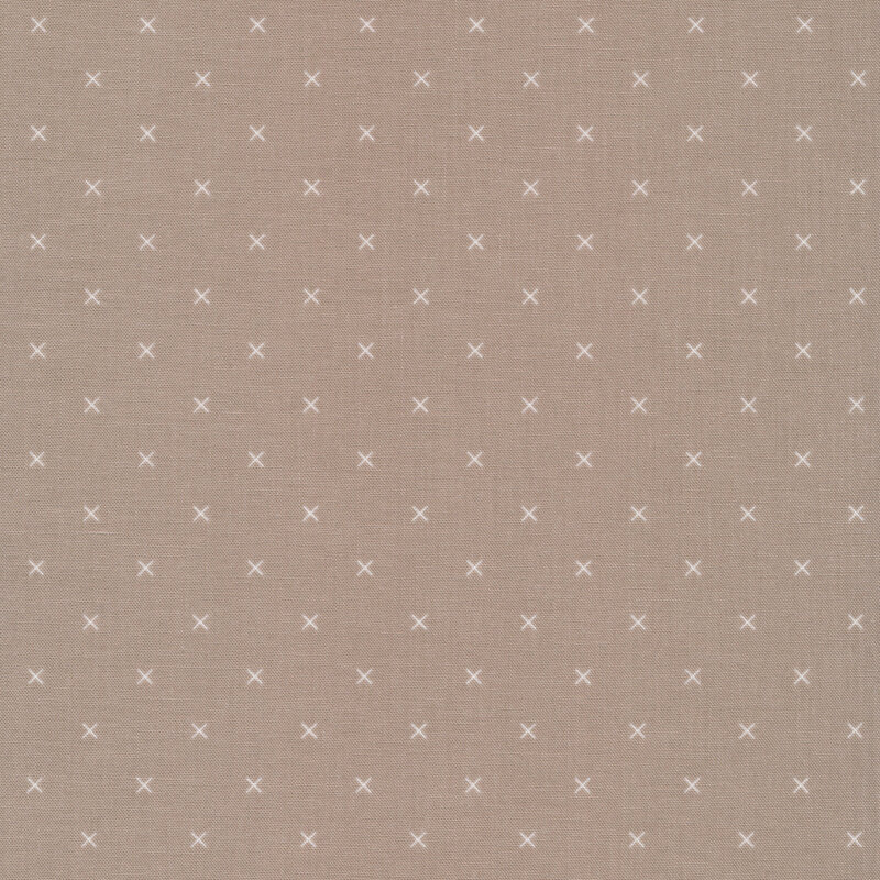 Small cream x's on a light brown background