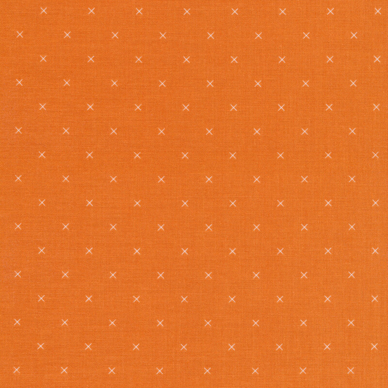 Small cream x's on an orange background
