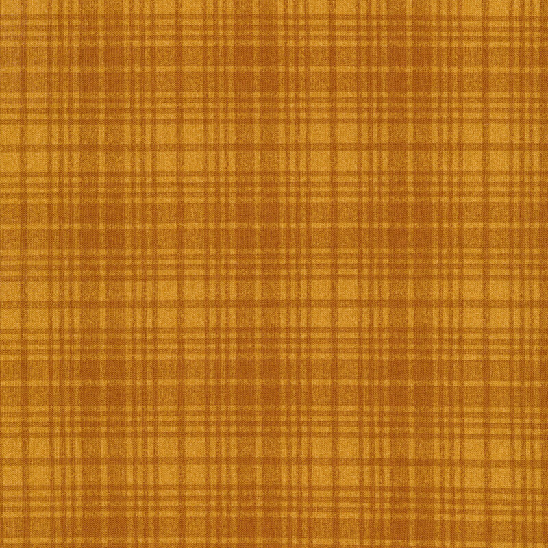 A tonal golden yellow plaid fabric