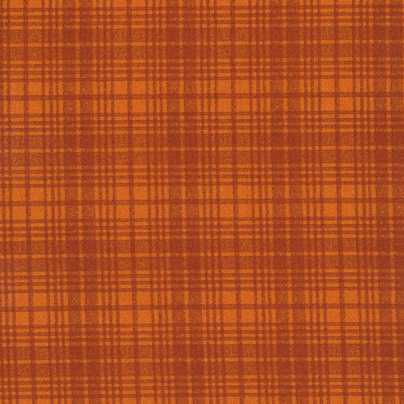 A tonal orange plaid fabric