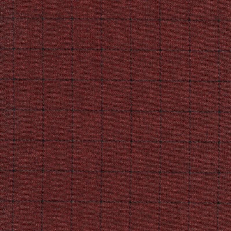 Cranberry red fabric with a black grid pattern