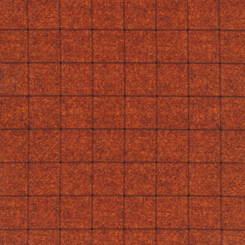 Burnt orange fabric with a black grid pattern