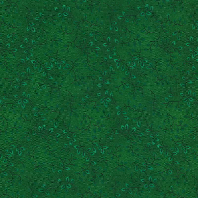 A kelly green tonal fabric with vines and mottling