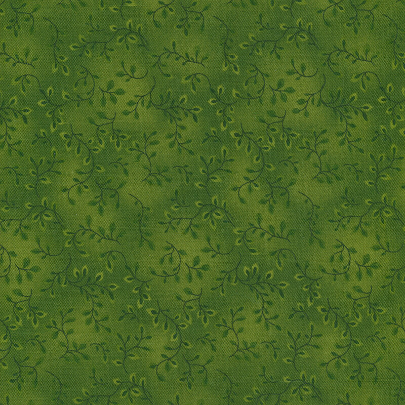 A tonal Christmas green colored fabric with vines and mottling