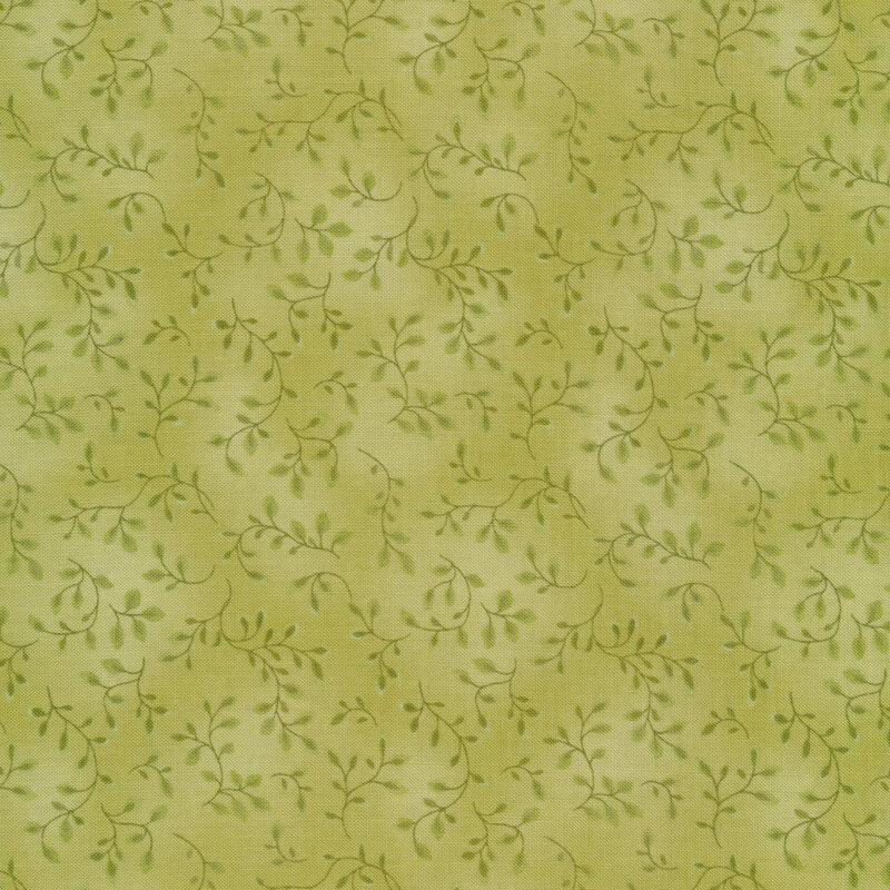 A tonal light green fabric with vines and mottling