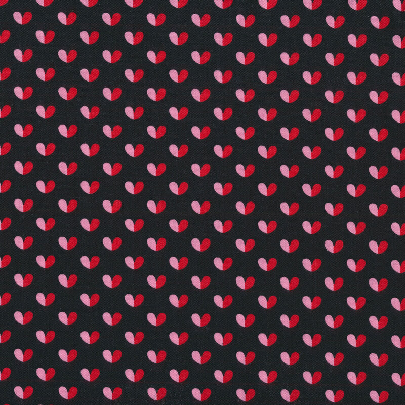 Black fabric with small red and pink hearts all over