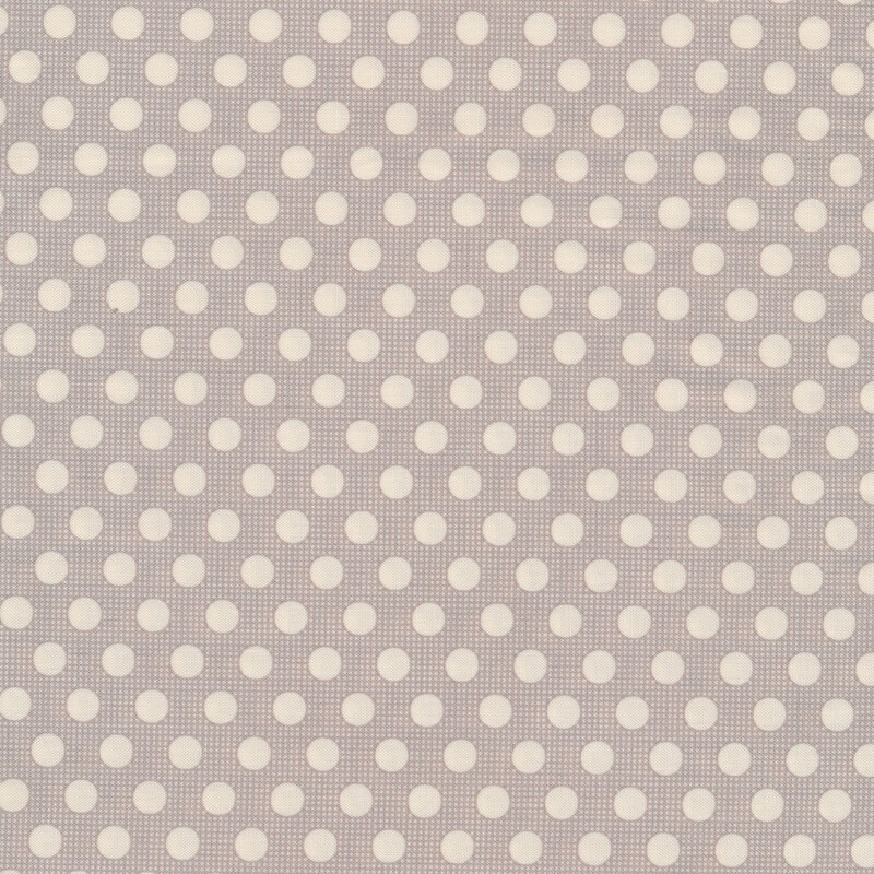 Grey fabric with white polka dots all over