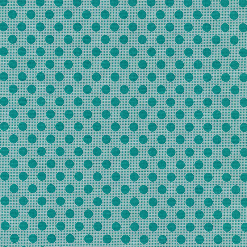 Teal sewing fabric with dark teal polka dots all over