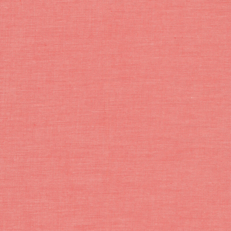 Coral pink chambray fabric.