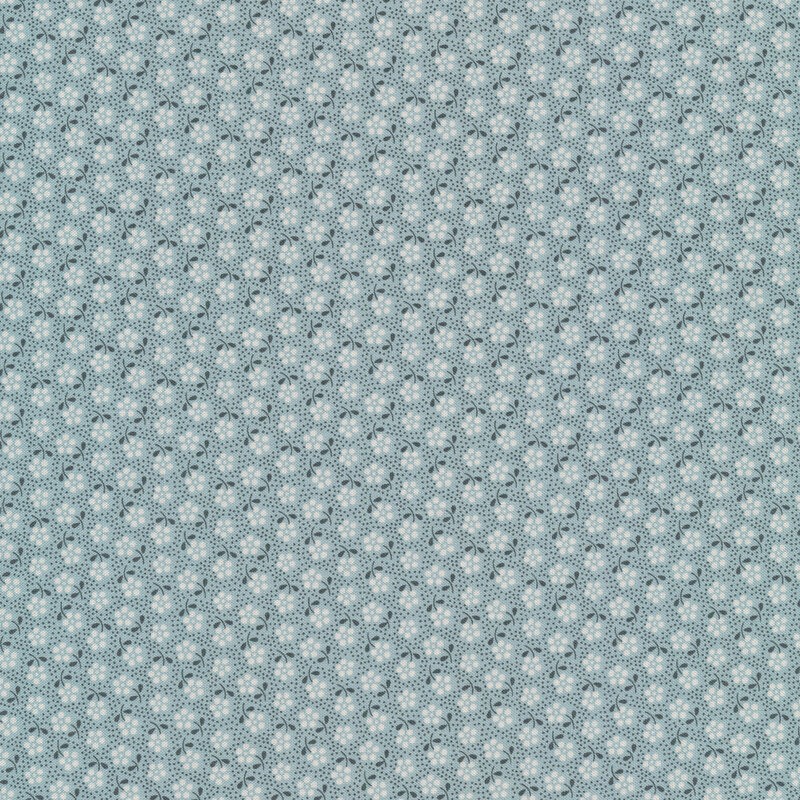Teal fabric with tossed white florals and small dots