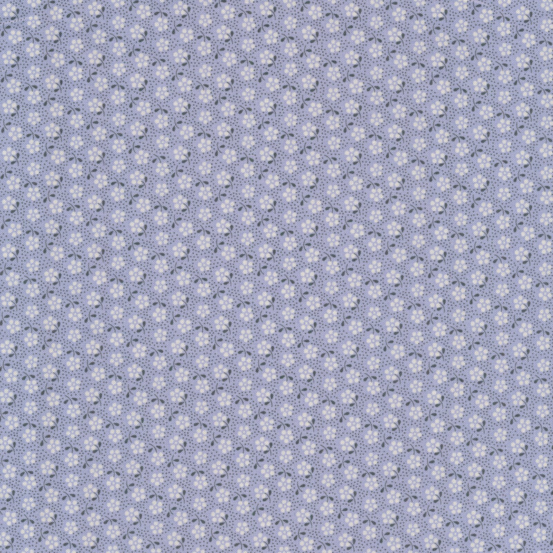 Pale purple fabric with tossed white florals and small dark purple dots