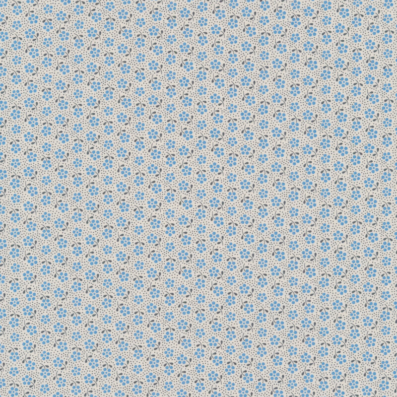 White fabric with tossed bright blue flowers and small dark grey dots