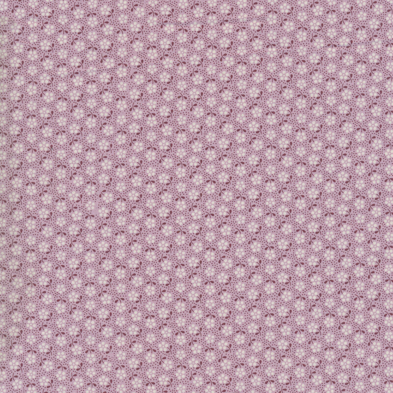 Light purple fabric with tossed white flowers and small dark purple dots