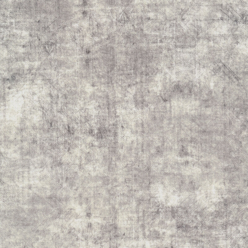 A grunge textured gray fabric with mottling