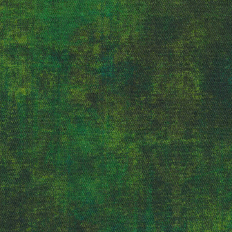 A grunge textured evergreen fabric with mottling