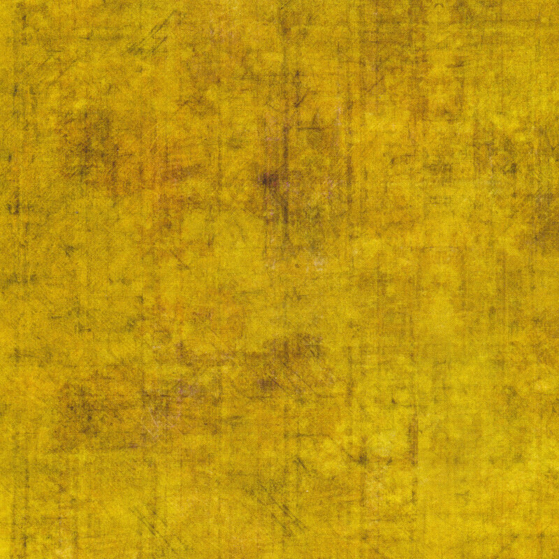 A yellow textured fabric with mottling