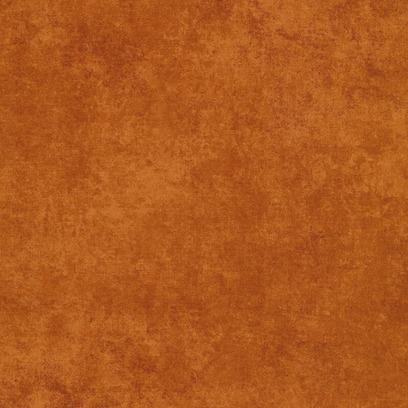 A burnt orange mottled fabric