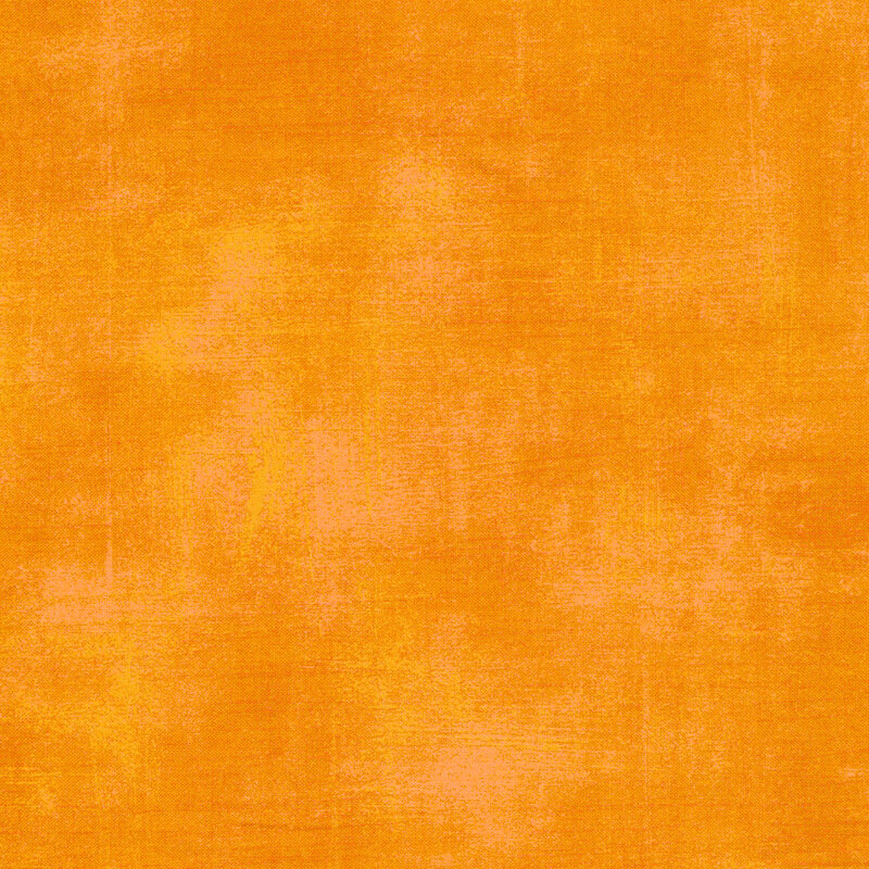 Golden orange fabric with bits of grunge texturing