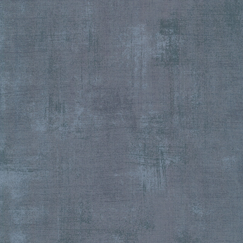 Dark gray fabric with bits of light grey grunge texturing