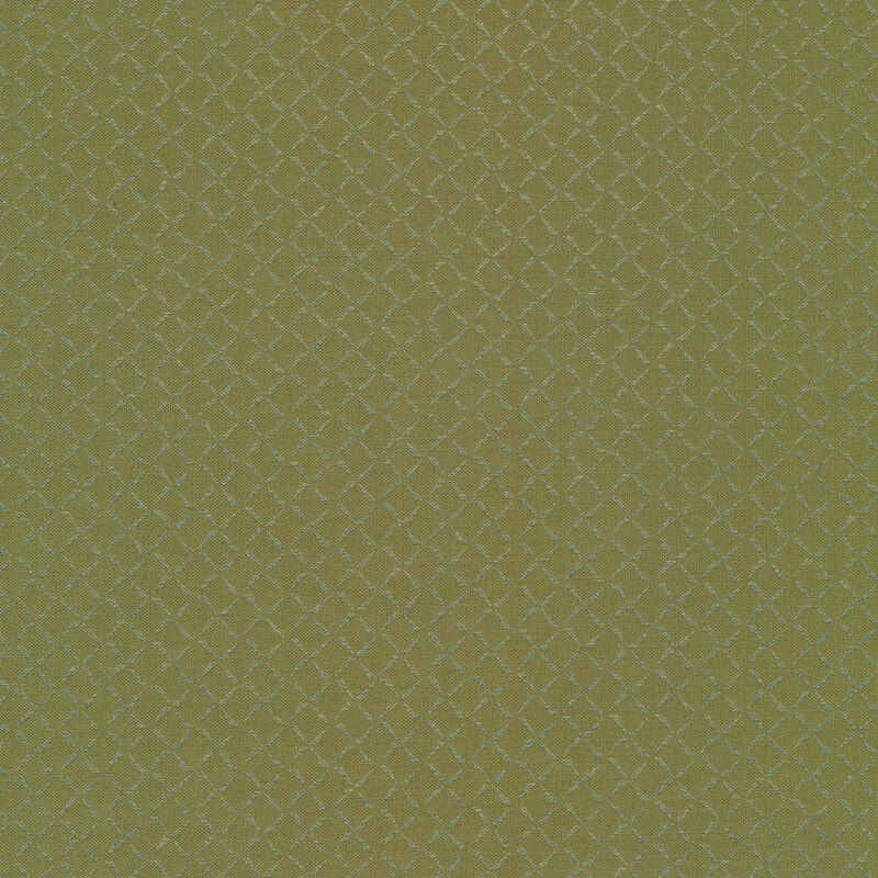 Green fabric with an iridescent geometric design