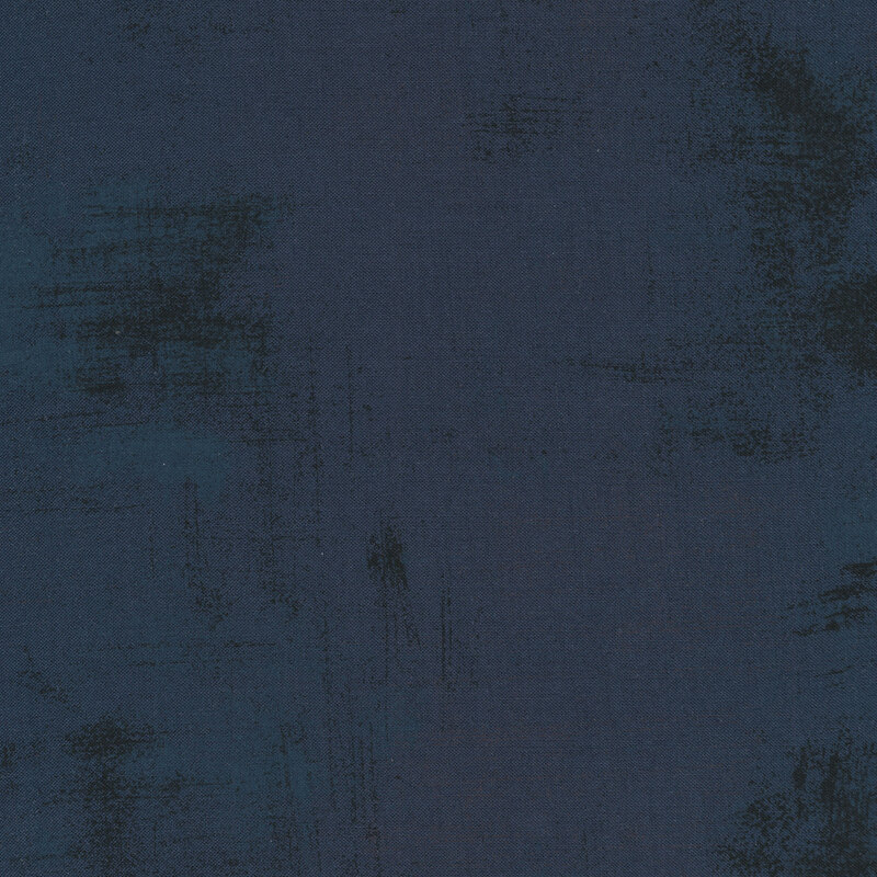 Navy fabric with bits of dark mottled grunge texturing