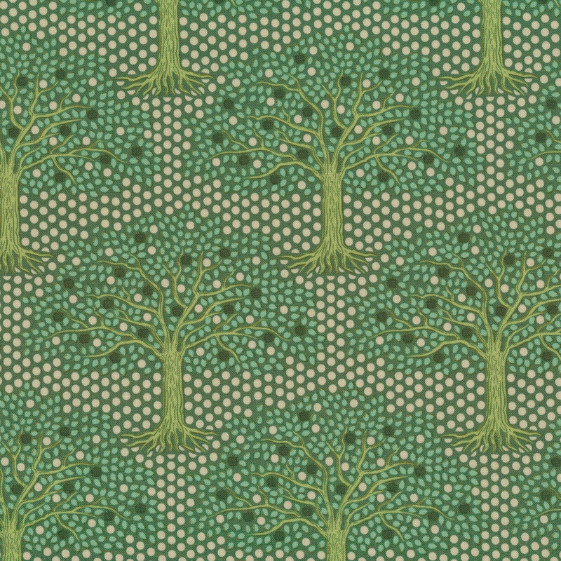 Green fabric with trees and alternating light and dark dots looking like fruit in the trees and filling negative space