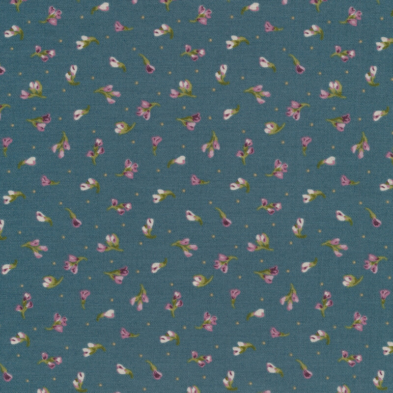 Fabric that has tossed florals with pink leaves on a blue background