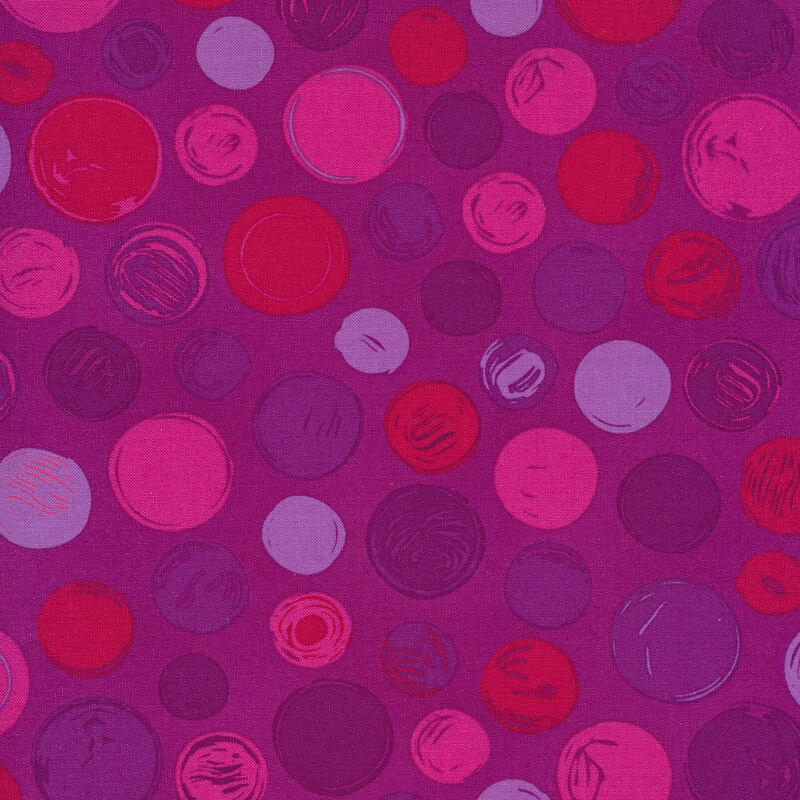 Bright violet fabric with pale purple, dark purple, pink, and red polka dots of varying sizes