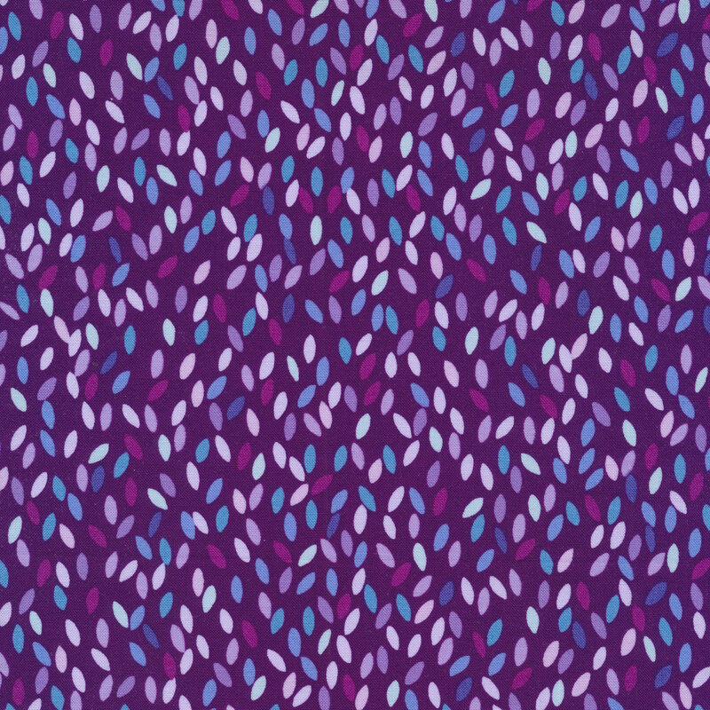 Dark purple fabric with colorful blue and light purple flower petals all over