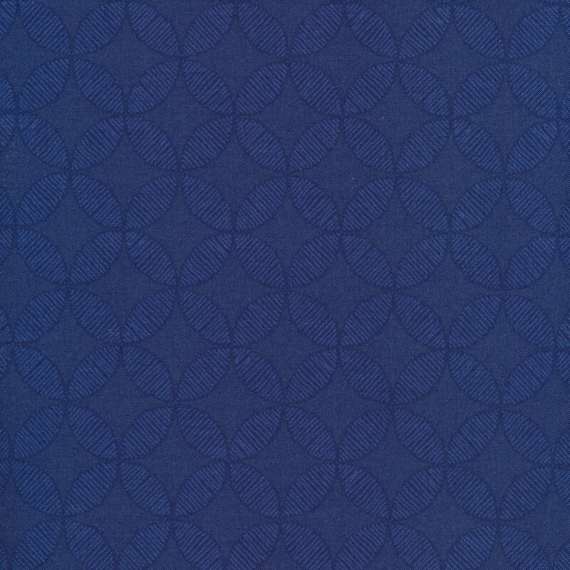 Navy blue tonal fabric with cathedral window designs