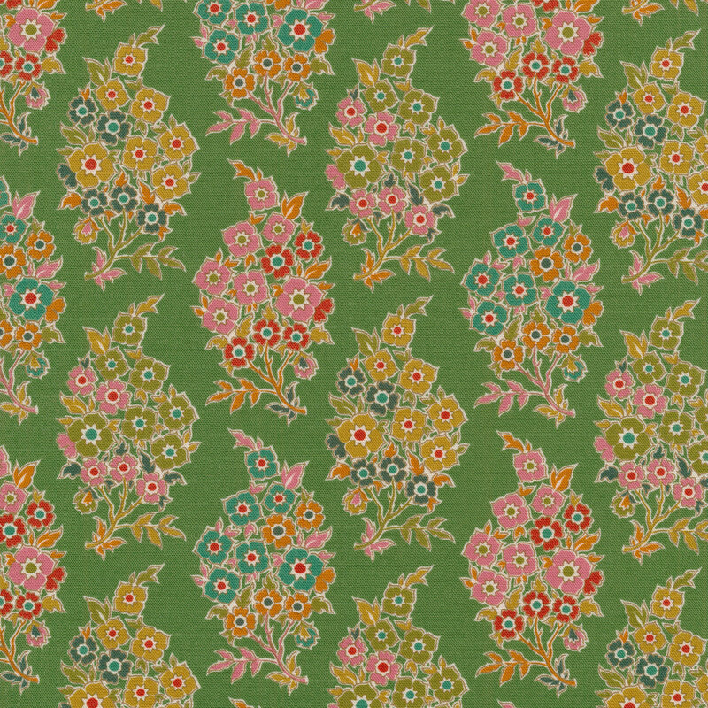 green fabric with bunches of teal, blue, green, pink and orange flowers